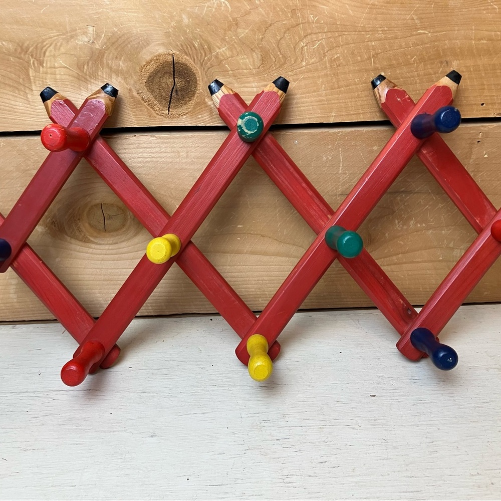 Red Wooden Accordion Wall Peg Rack with Colorful Pegs - Kids Toys
